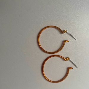 Orange hoop earrings